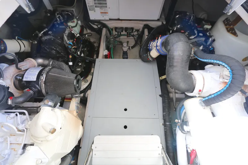 Slide: The Image of Engine room of a 2013 Meridian 441 Sedan yacht, showcasing mechanical components. - 15