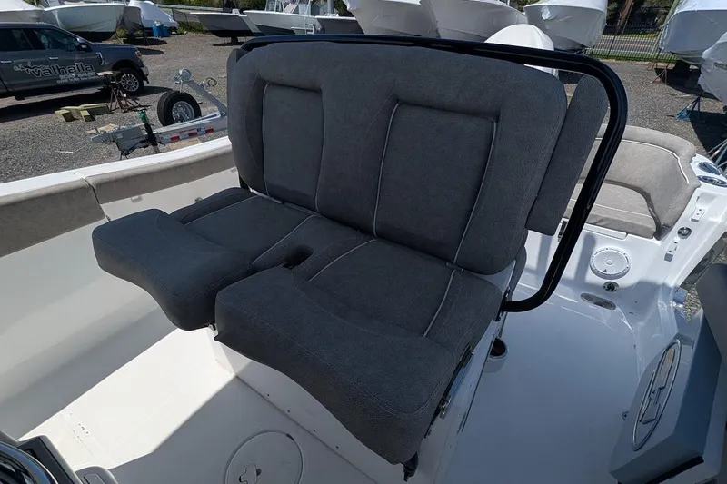 Slide: The Image of Open storage compartment on 2025 Sea Hunt Ultra 255 SE boat deck. - 12