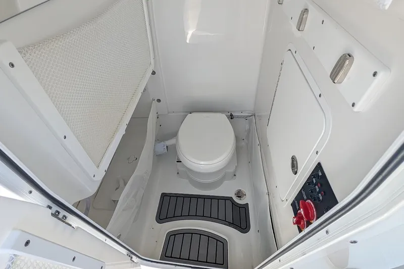 Slide: The Image of Luxurious seating area on 2025 Sea Hunt Ultra 255 SE boat with cup holders. - 18