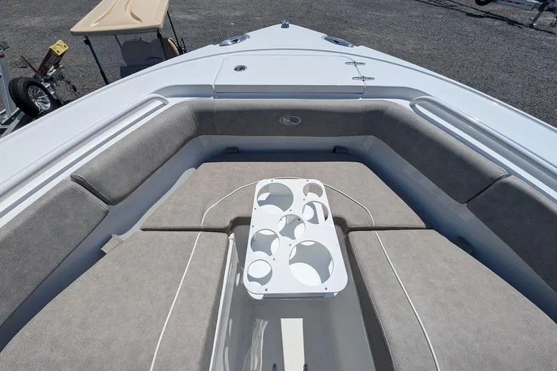 Slide: The Image of Anchor compartment of 2025 Sea Hunt Ultra 255 SE boat, featuring modern fittings. - 21