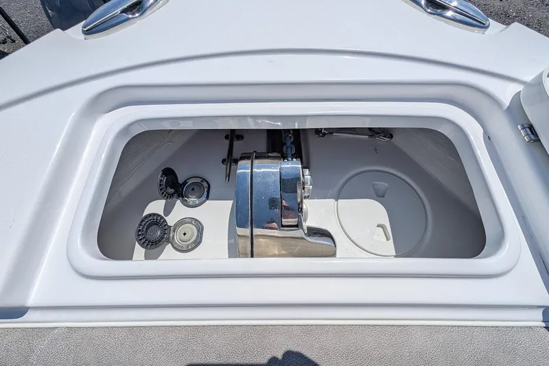 Slide: The Image of 2025 Sea Hunt Ultra 255 SE boat interior with seating and deck view. - 22
