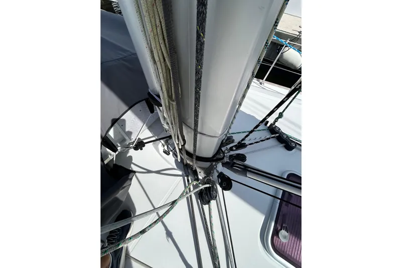 Slide: The Image of Interior view of 2011 Jeanneau Sun Odyssey 44i sailboat cockpit with ropes and winches. - 10