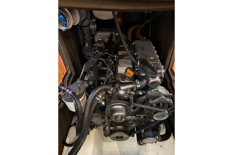 Slide: The Image of Engine of a 2011 Jeanneau Sun Odyssey 44i sailboat, featuring Yanmar components. - 24