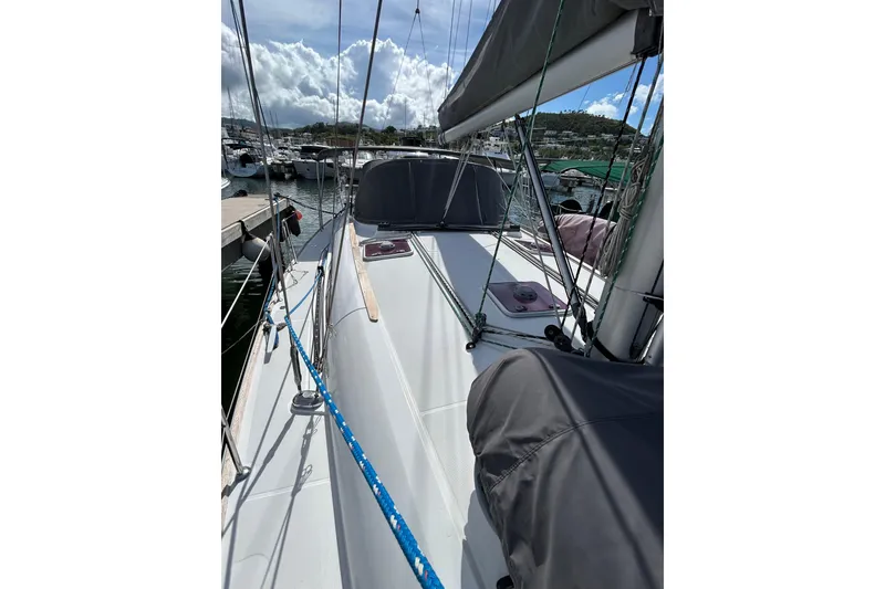 Slide: The Image of Cockpit view of 2011 Jeanneau Sun Odyssey 44i sailboat docked at marina. - 4