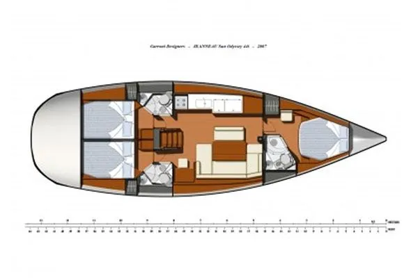 Slide: The Image of Interior of 2011 Jeanneau Sun Odyssey 44i yacht with cozy seating and wooden finishes. - 40