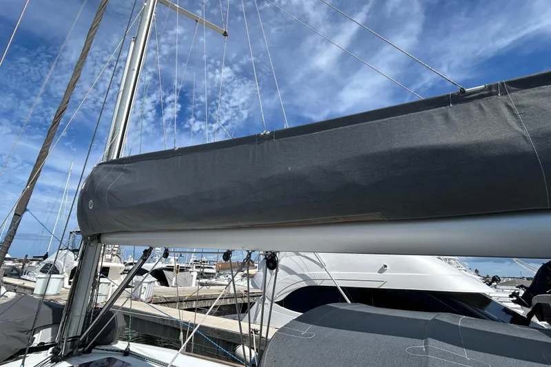 Slide: The Image of Bow view of 2011 Jeanneau Sun Odyssey 44i sailboat, showcasing anchor and deck details. - 7