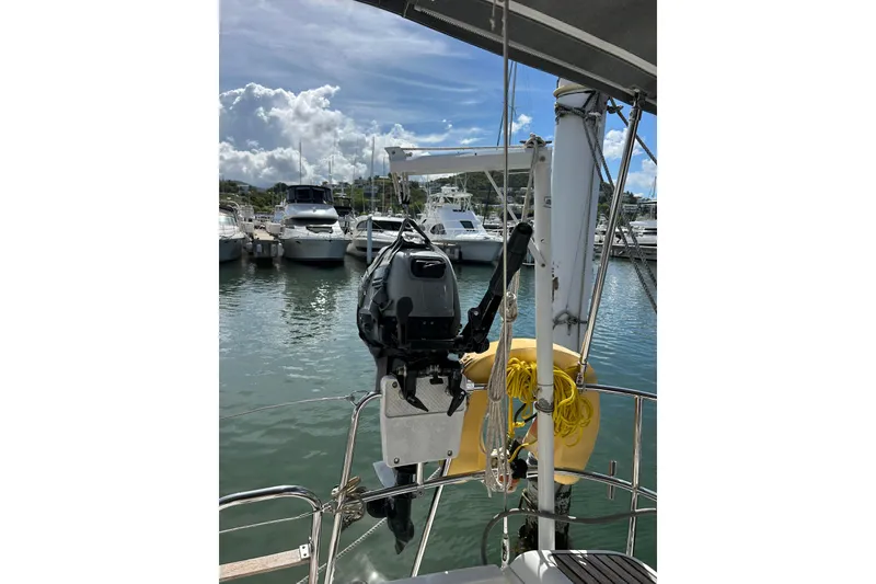 Slide: The Image of Sailboat Jeanneau Sun Odyssey 44i, 2011 model, docked at marina under blue sky. - 8