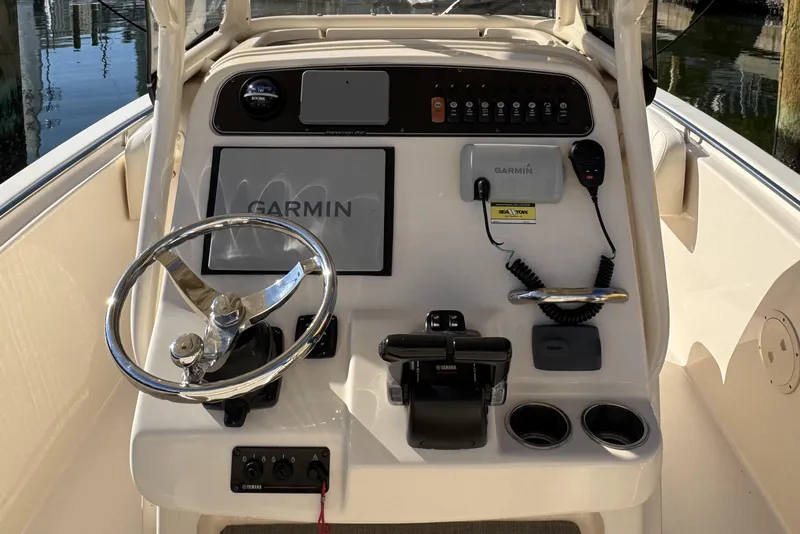 Slide: The Image of 2017 Grady-White Fisherman 257 helm with Garmin navigation and Yamaha controls. - 11