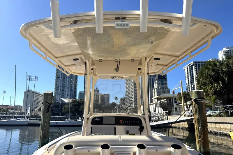 Slide: The Image of 2017 Grady-White Fisherman 257 boat docked in urban marina with city skyline. - 12