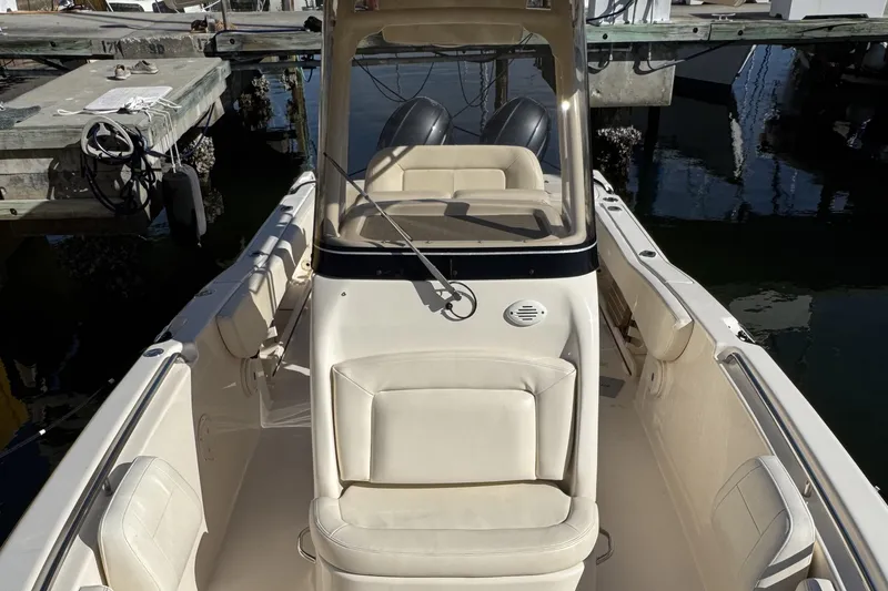 Slide: The Image of 2017 Grady-White Fisherman 257 boat interior with seating and steering console. - 14
