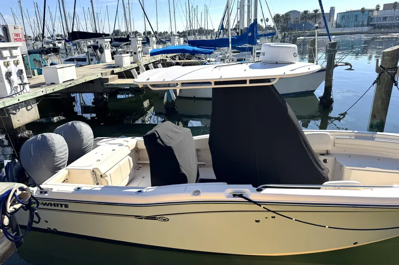 Slide: The Image of 2017 Grady-White Fisherman 257 boat docked at marina with covered seats. - 5