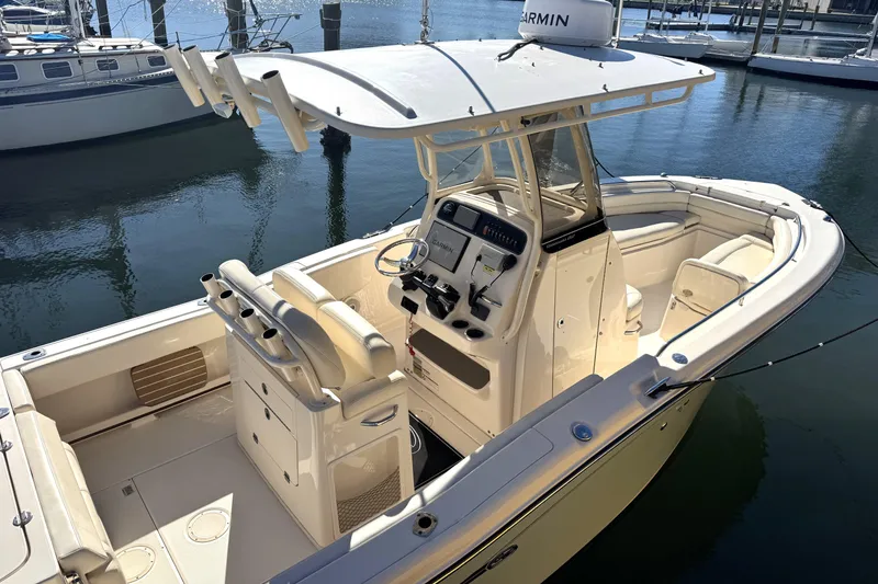 Slide: The Image of 2017 Grady-White Fisherman 257 boat with center console, docked in a marina. - 6