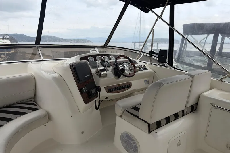 Slide: The Image of Interior of a 2006 Meridian 411 Sedan yacht with modern navigation controls. - 14