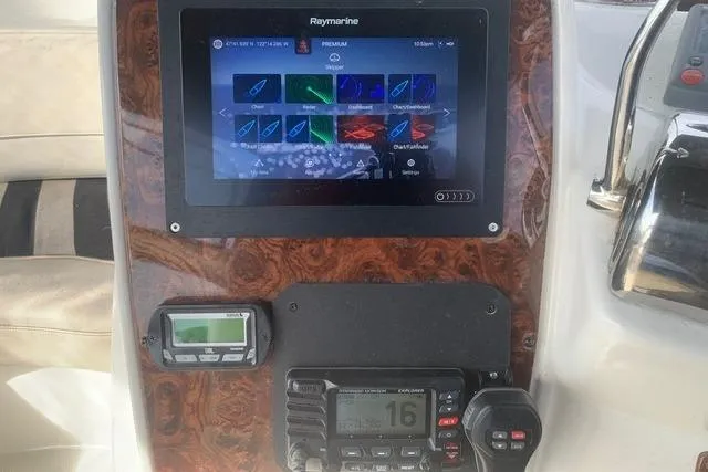 Slide: The Image of Control panel of a 2006 Meridian 411 Sedan with Raymarine navigation system. - 19