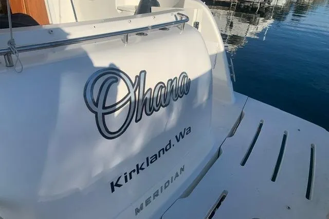 Slide: The Image of 2006 Meridian 411 Sedan boat named "Ohana" docked in Kirkland, WA. - 3