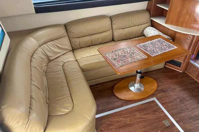 Slide: The Image of Luxurious leather seating area in a 2006 Meridian 411 Sedan yacht interior. - 30