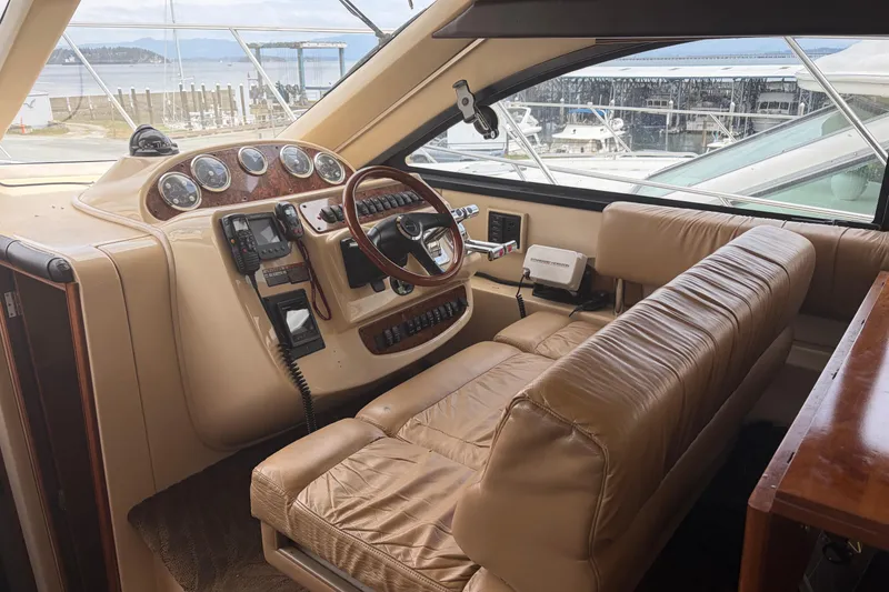 Slide: The Image of 2006 Meridian 411 Sedan helm with leather seating and navigational controls. - 38
