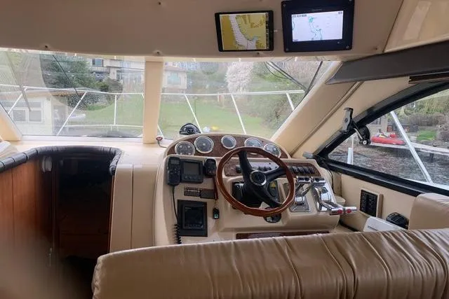 Slide: The Image of Interior view of a 2006 Meridian 411 Sedan yacht cockpit with navigation equipment. - 39