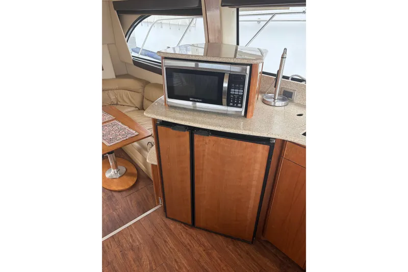 Slide: The Image of Interior of 2006 Meridian 411 Sedan with microwave and compact fridge. - 44