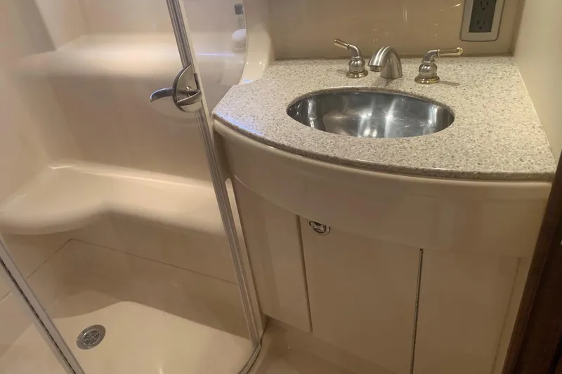 Slide: The Image of Bathroom interior of 2006 Meridian 411 Sedan with sink and shower. - 57