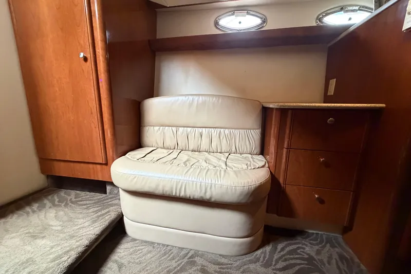 Slide: The Image of Luxurious interior of 2006 Meridian 411 Sedan with leather seating and wooden cabinetry. - 67