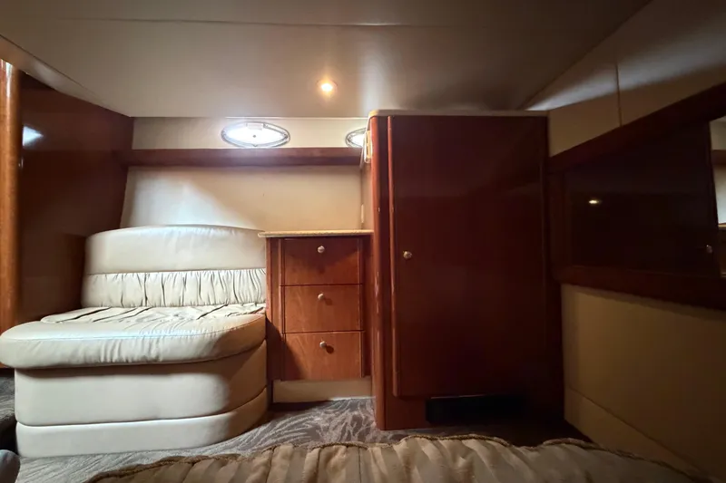Slide: The Image of Interior of 2006 Meridian 411 Sedan yacht with seating and wooden cabinetry. - 69