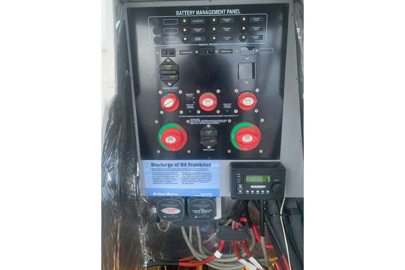 Slide: The Image of Battery management panel on a 2006 Meridian 411 Sedan boat. - 74