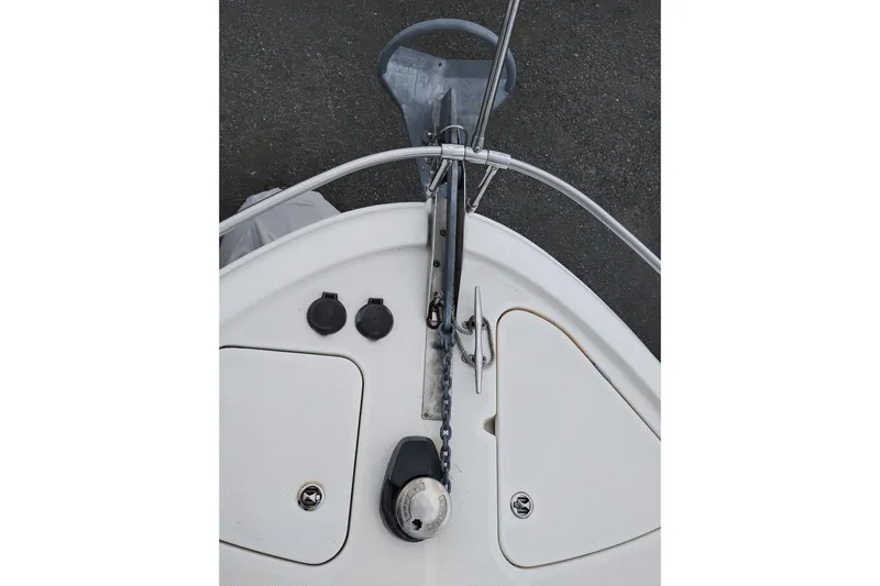 Slide: The Image of Bow of a 2006 Meridian 411 Sedan yacht with anchor and chain detail. - 87