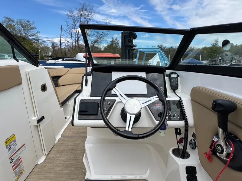 Slide: The Image of Interior of 2021 Sea Ray 230SPX with beige upholstery. - 25