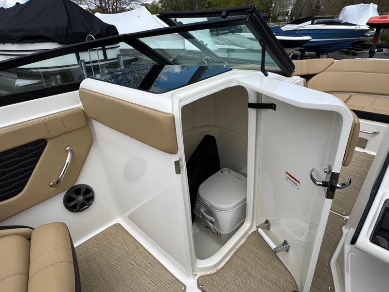 Slide: The Image of Engine compartment of a 2021 Sea Ray 230SPX boat. - 30