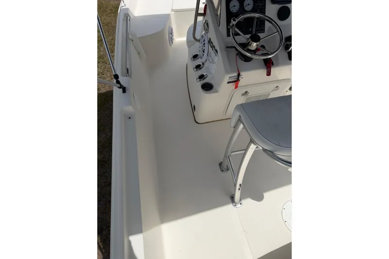 Slide: The Image of 2016 Bulls Bay 2000 boat interior with steering console and seating. - 8