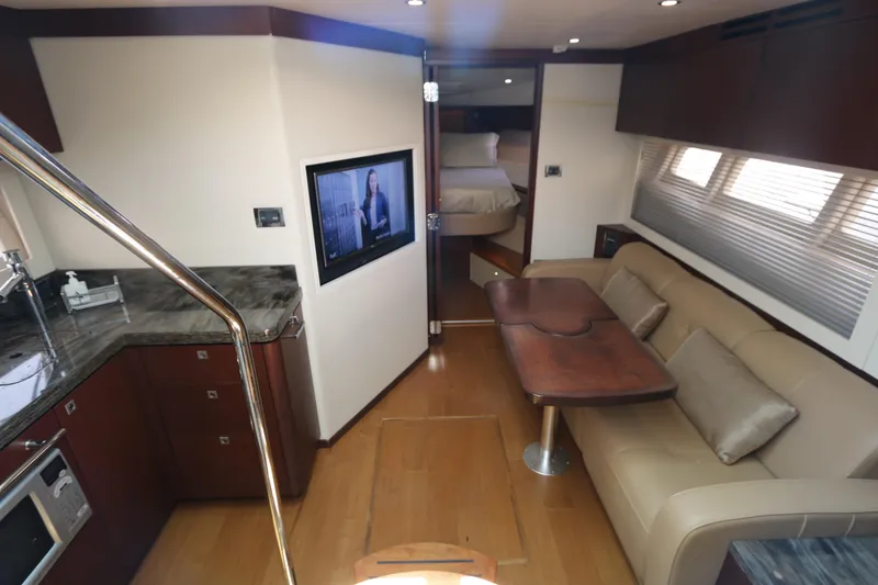 Slide: The Image of Luxurious interior of 2013 Searay 41 yacht with modern amenities and elegant design. - 10