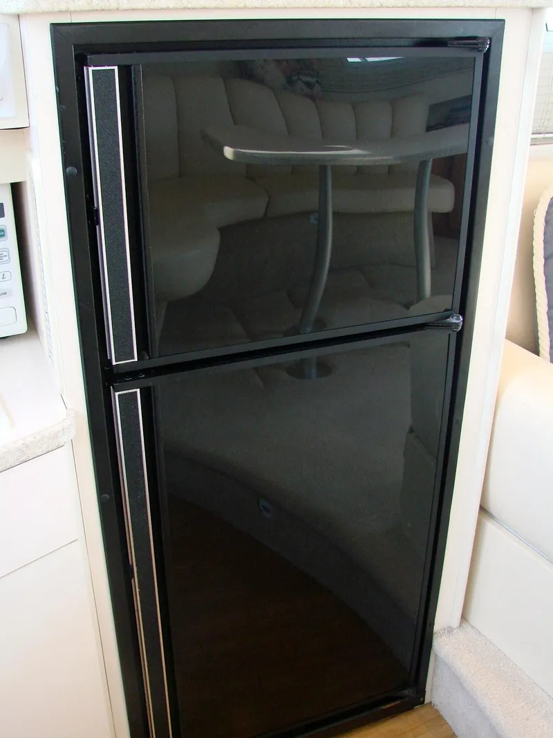 Slide: The Image of Refrigerator in 1999 Silverton 351 Sedan yacht interior. - 16