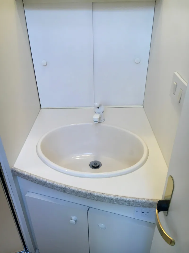 Slide: The Image of Bathroom sink in 1999 Silverton 351 Sedan. - 28