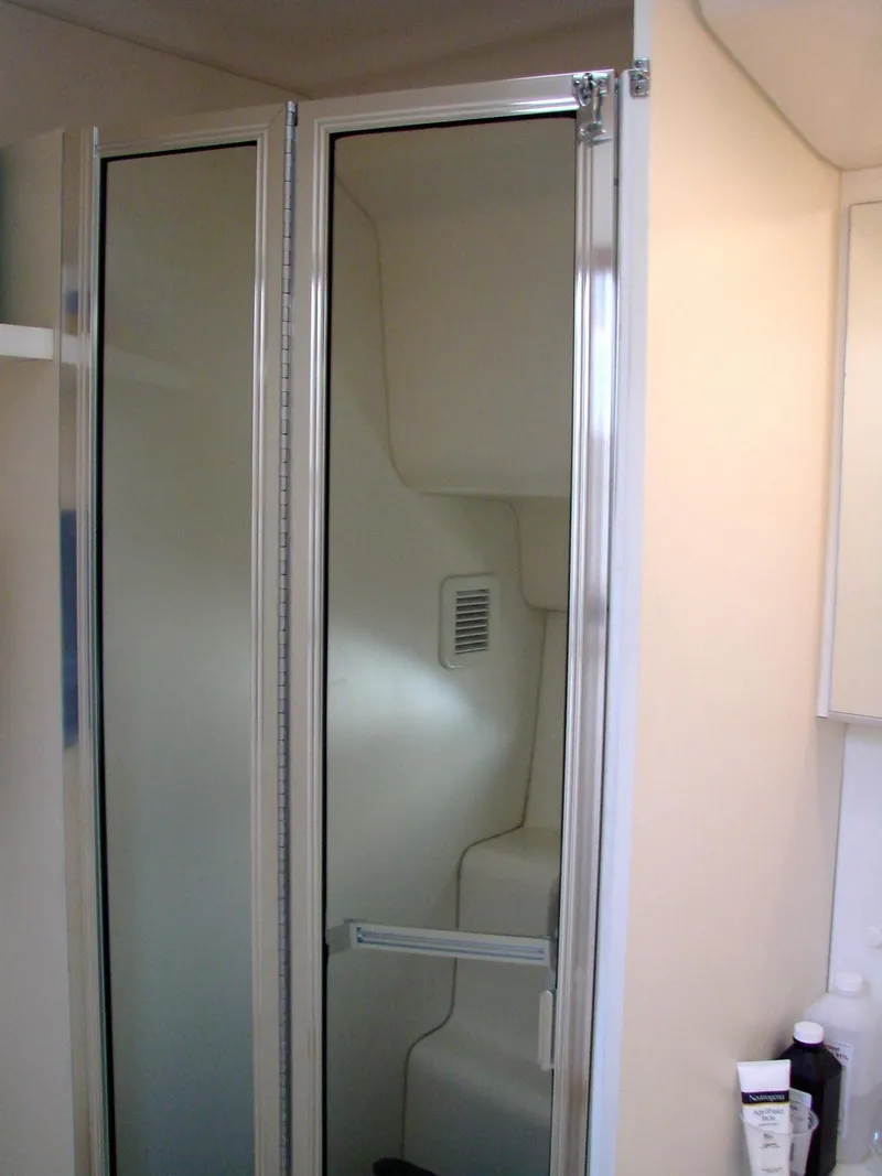 Slide: The Image of 1999 Silverton 351 Sedan shower interior view. - 30
