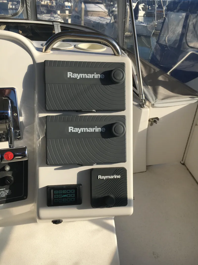 Slide: The Image of Raymarine controls on 1999 Silverton 351 Sedan. - 6