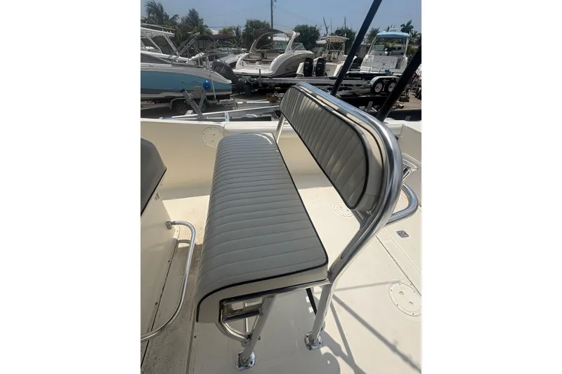 Slide: The Image of 1998 Pursuit 2870 Center Console boat with sleek seating and stainless steel frame. - 18