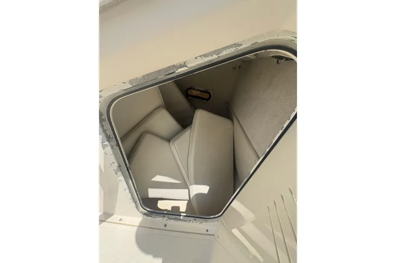 Slide: The Image of Interior cabin view of a 1998 Pursuit 2870 Center Console boat. - 29