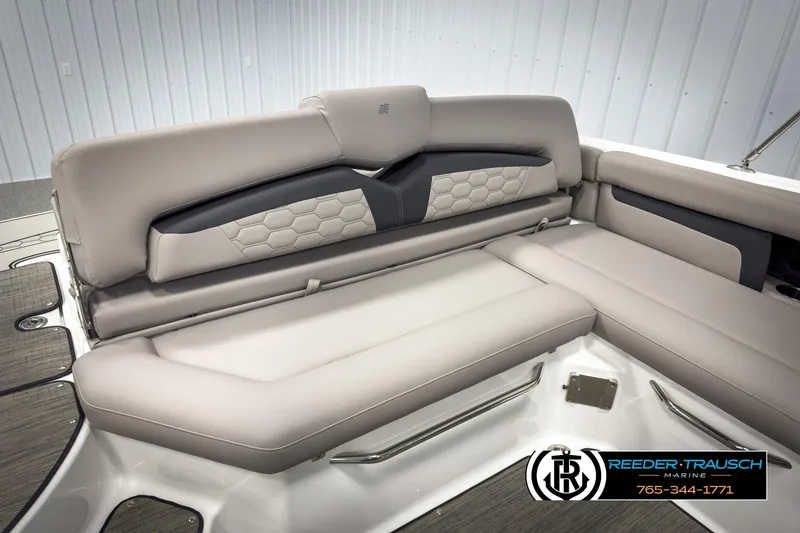 Slide: The Image of 2025 Four Winns HD3 boat interior with luxurious beige seating and modern design. - 25
