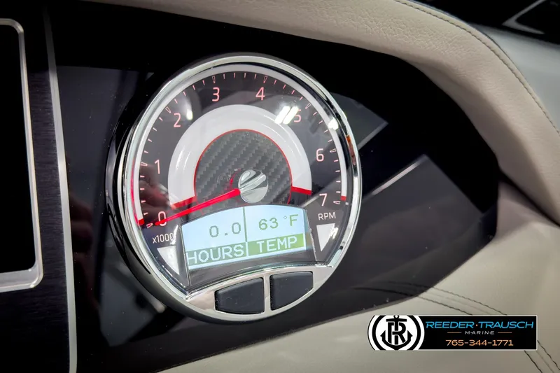 Slide: The Image of 2025 Four Winns HD3 dashboard gauge displaying RPM and temperature. - 34