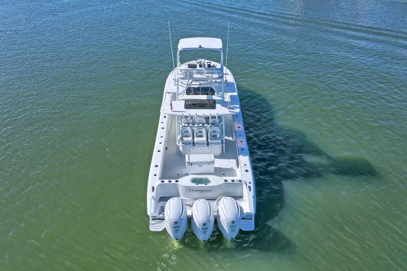 Slide: The Image of 2015 Yellowfin 42 Offshore boat on calm water. - 8