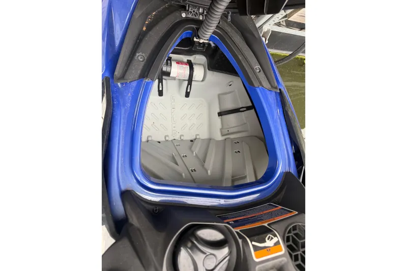 Slide: The Image of Open storage compartment of a 2020 Sea-Doo Wake 170 watercraft. - 12