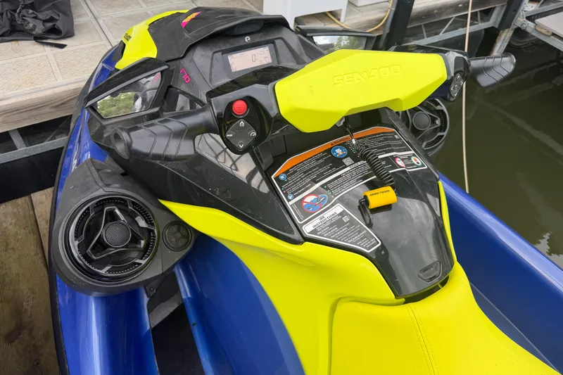 Slide: The Image of 2020 Sea-Doo Wake 170 jet ski dashboard with vibrant yellow and blue design. - 5