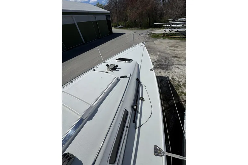 Slide: The Image of 2011 J Boats J/95 sailboat deck view, showcasing sleek design and rigging details. - 16