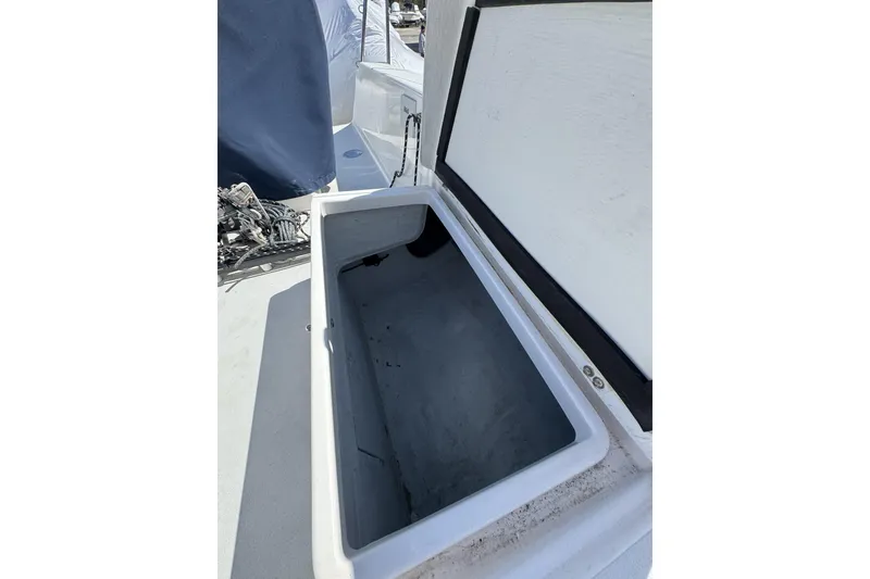 Slide: The Image of Open storage compartment on 2011 J Boats J/95 sailboat deck. - 20