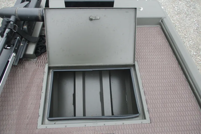 Slide: The Image of Open storage compartment on 2024 Gator Tail 1848 Gator Series boat deck. - 9