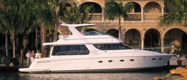 The Image of 2003 Carver 530 Voyager Pilothouse yacht cruising on open water. - 0