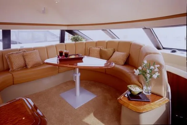 Slide: The Image of 2003 Carver 530 Voyager Pilothouse yacht cruising on open water. - 2