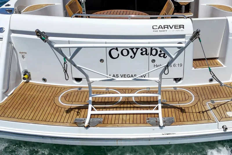 Slide: The Image of 2003 Carver 530 Voyager Pilothouse yacht with teak deck and custom nameplate. - 29
