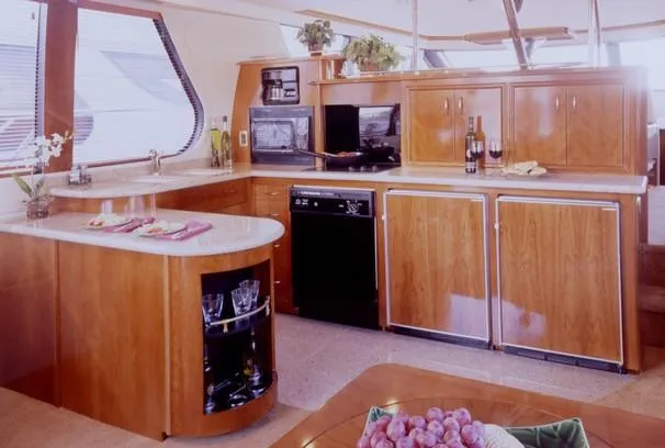 Slide: The Image of 2003 Carver 530 Voyager Pilothouse yacht cruising on blue ocean waters. - 3